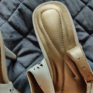 White shoes 7m with a white purse backpack style